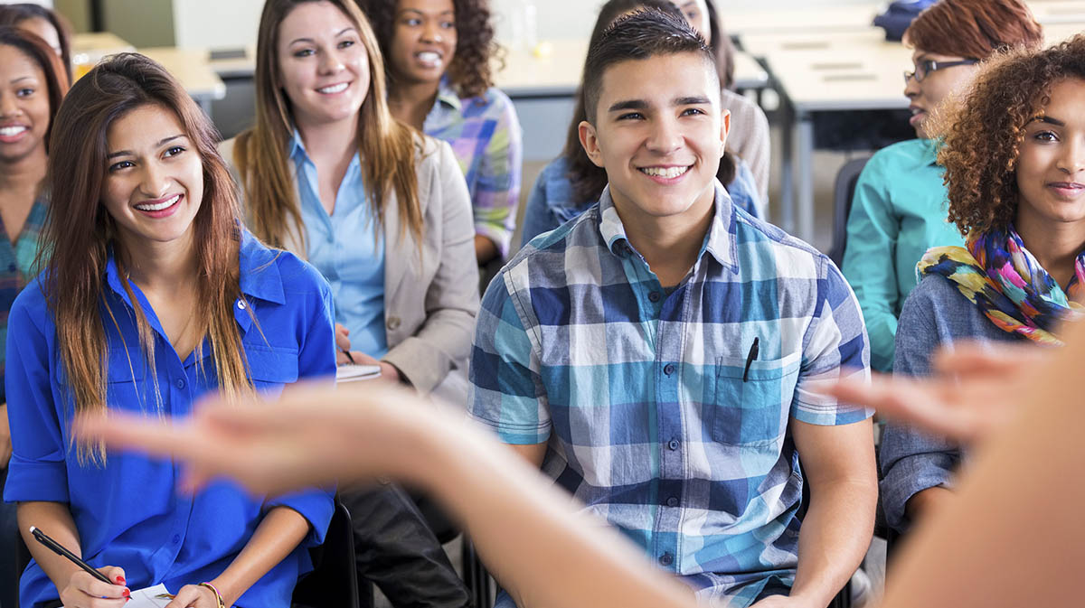 Happy students in class
