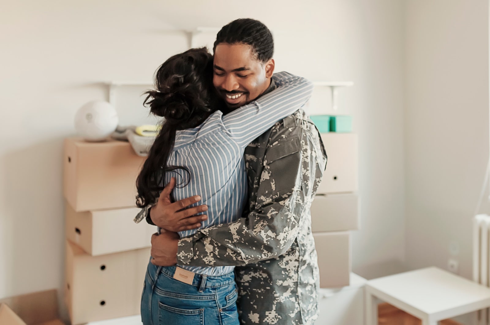 Military family celebrating homeownership