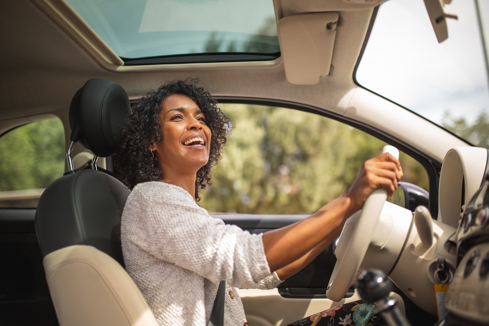 Driver enjoying a new car