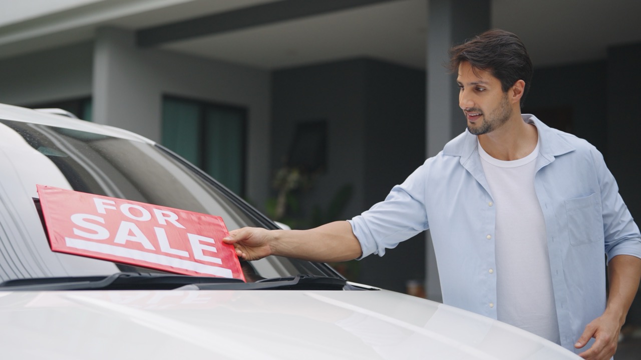 Driver getting ready to buy a used car