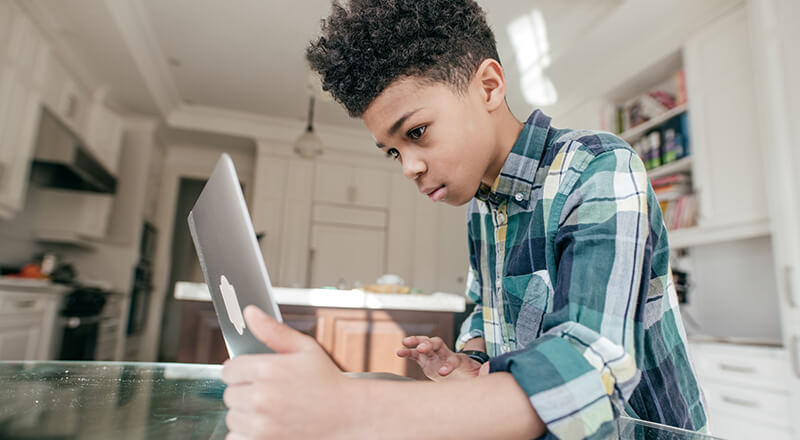 Young kid uses Banzai Financial Education Program