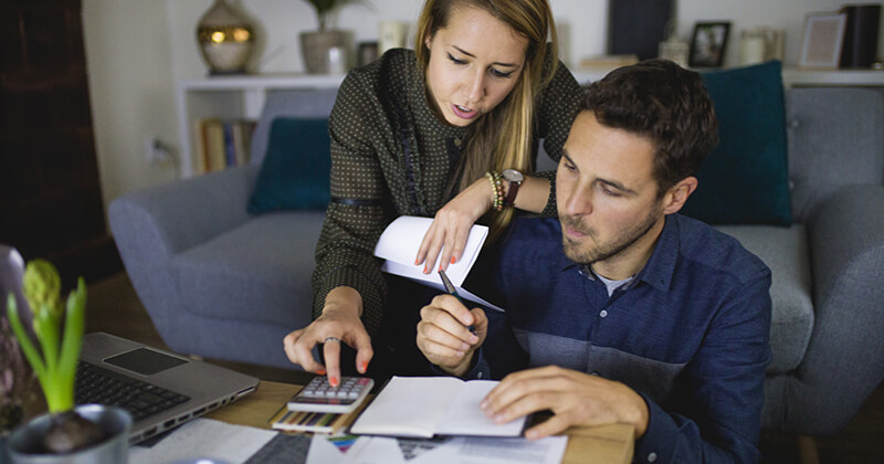 Couple reviewing their finances.