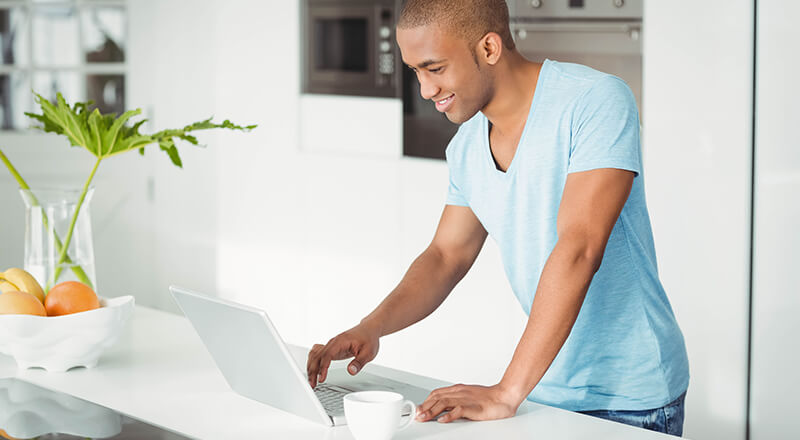 Young adult man using Banzai Financial Education Program